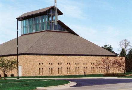 Representative photograph of a brick parish church exterior with stone detailing
